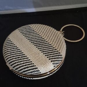 Elegant Black and Cream Woven Clutch